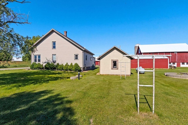 W444 Carlson Ln, Oconto Falls, WI 54154 - view of grassy yard with an outdoor structure