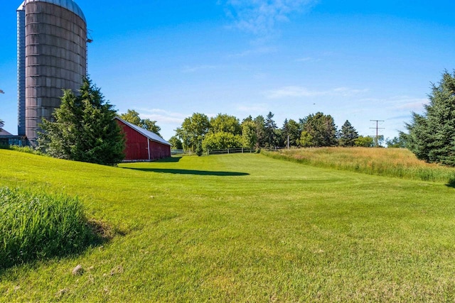 W444 Carlson Ln, Oconto Falls, WI 54154 - view of green lawn featuring an outdoor structure