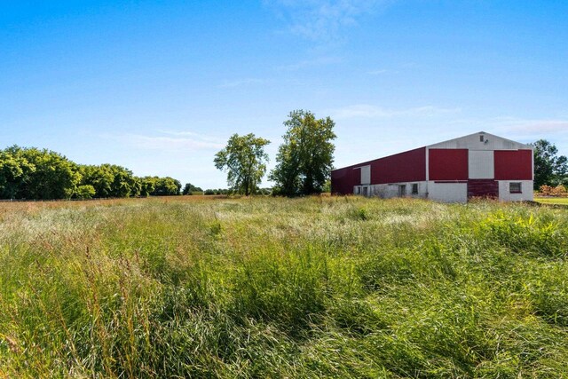 W444 Carlson Ln, Oconto Falls, WI 54154 - view of yard featuring an outdoor structure and a pole building