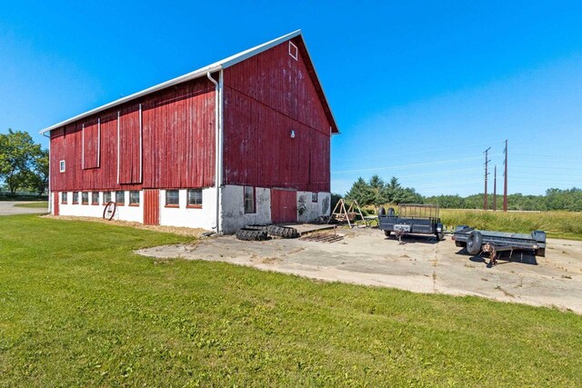 W444 Carlson Ln, Oconto Falls, WI 54154 - view of barn featuring a lawn