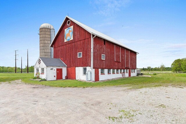 W444 Carlson Ln, Oconto Falls, WI 54154 - view of barn with a yard