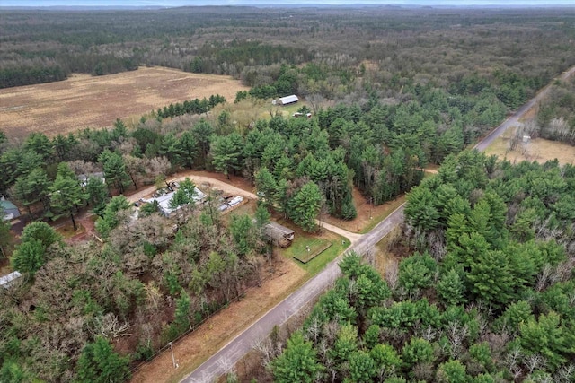 aerial view featuring a forest view