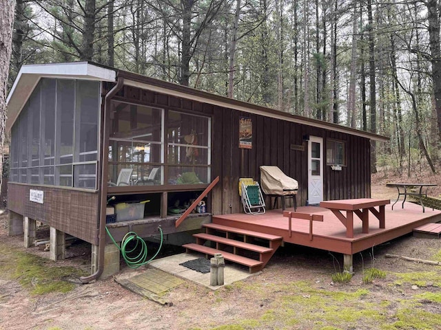 exterior space with a sunroom