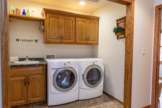 6258 Ninebark Rd, Abrams, WI 54153 - washroom with cabinet space, separate washer and dryer, and baseboards