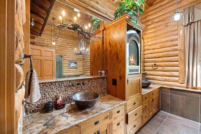W2470 County Road B, Montello, WI 53949 - full bath with rustic walls, vanity, tasteful backsplash, and tile patterned flooring