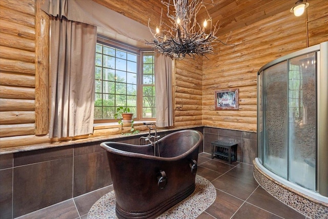 W2470 County Road B, Montello, WI 53949 - full bathroom featuring rustic walls, a stall shower, a soaking tub, a chandelier, and tile patterned floors