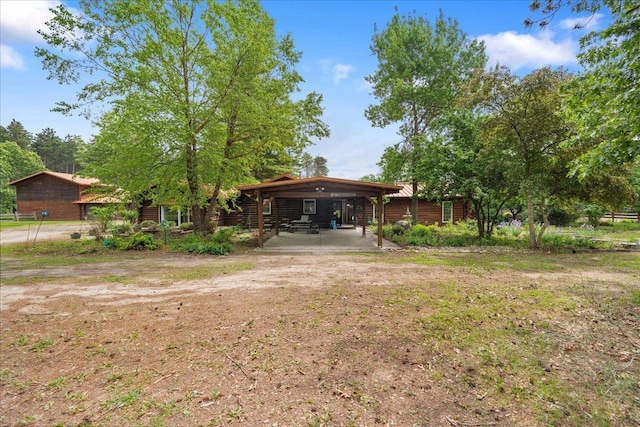 W2470 County Road B, Montello, WI 53949 - rear view of house with a carport