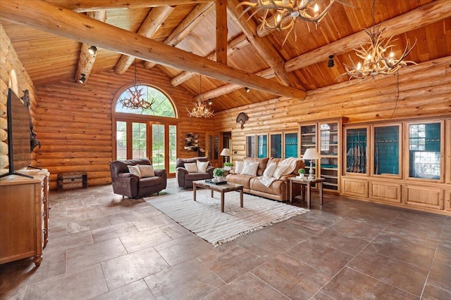 W2470 County Road B, Montello, WI 53949 - living area with a chandelier, wooden ceiling with exposed beams, plenty of natural light, rustic walls, and high vaulted ceiling