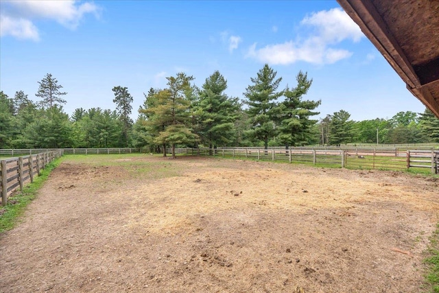 W2470 County Road B, Montello, WI 53949 - view of yard featuring an enclosed horse arena, a view of countryside, and a forest view