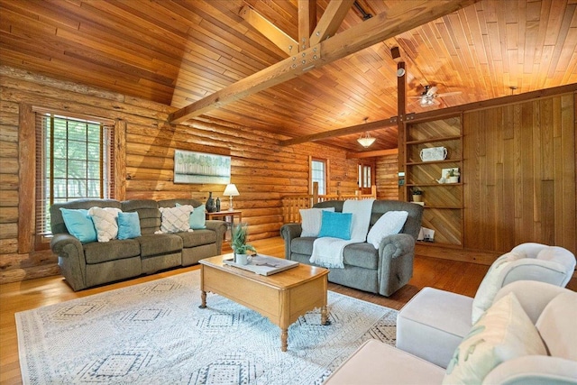 W2470 County Road B, Montello, WI 53949 - living area with wooden ceiling with exposed beams, a ceiling fan, wood finished floors, and log walls