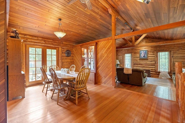 W2470 County Road B, Montello, WI 53949 - dining room featuring wooden ceiling, light wood-style floors, french doors, and log walls