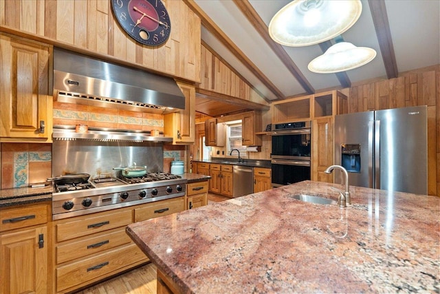 W2470 County Road B, Montello, WI 53949 - kitchen with appliances with stainless steel finishes, wall chimney range hood, dark stone countertops, decorative backsplash, and a sink