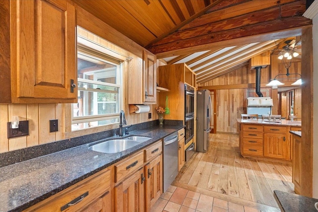 W2470 County Road B, Montello, WI 53949 - kitchen with a sink, stainless steel appliances, a ceiling fan, wooden ceiling, and wood walls