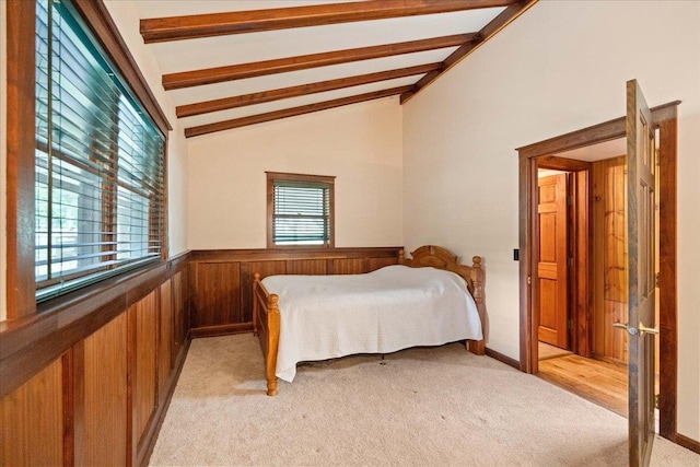 W2470 County Road B, Montello, WI 53949 - bedroom featuring wainscoting, light carpet, and wooden walls