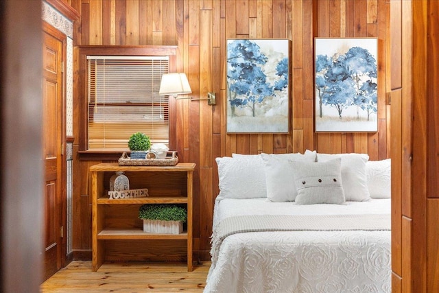 W2470 County Road B, Montello, WI 53949 - bedroom featuring wooden walls and wood finished floors