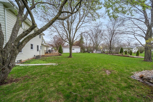 view of yard featuring a wooden deck