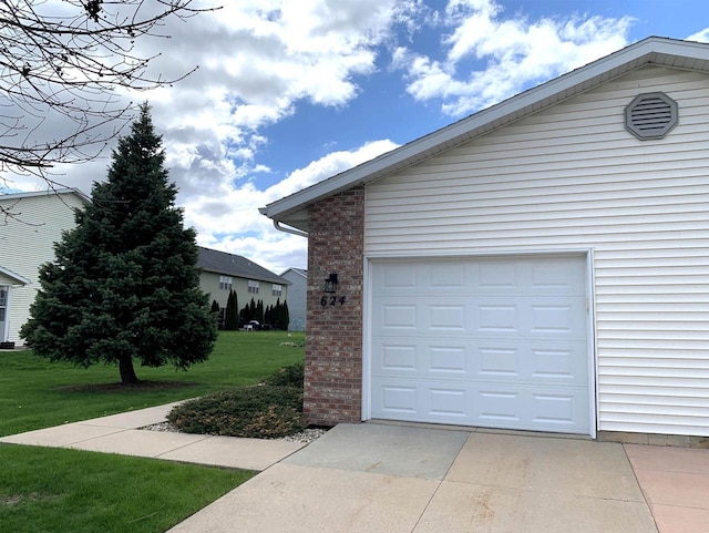 garage featuring driveway