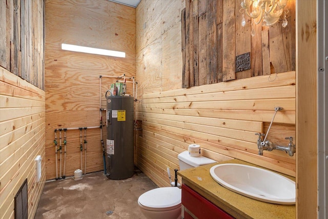 half bathroom with visible vents, wooden walls, vanity, electric water heater, and unfinished concrete floors