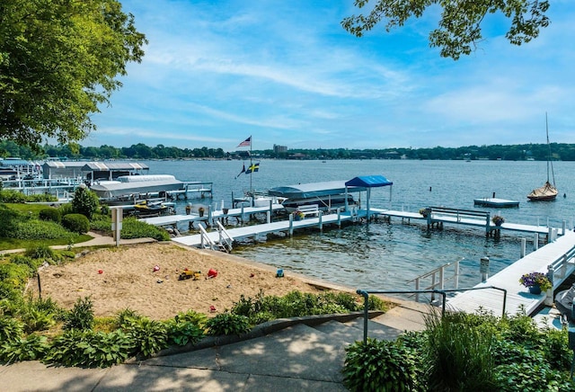 view of dock with a water view and boat lift