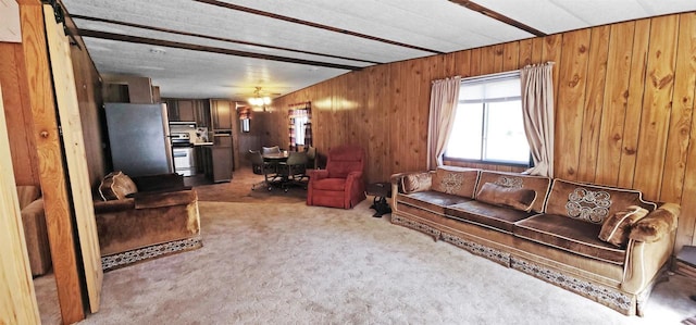 N7120 Sullivan Ln, New Lisbon, WI 53950 - living room featuring wood walls, carpet flooring, an office area, and a ceiling fan