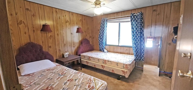 N7120 Sullivan Ln, New Lisbon, WI 53950 - bedroom with carpet, wooden walls, and ceiling fan