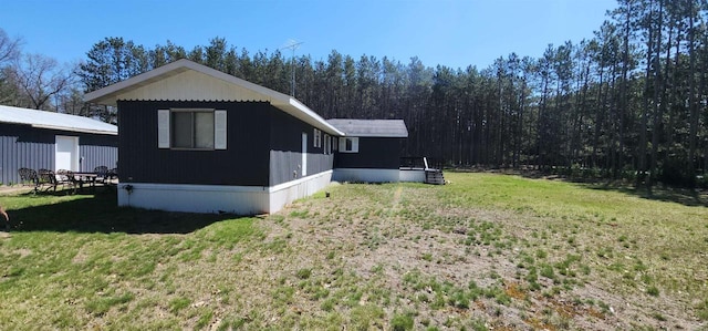 N7120 Sullivan Ln, New Lisbon, WI 53950 - view of property exterior with a yard
