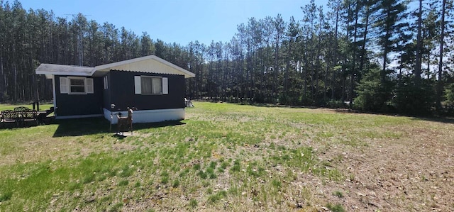 N7120 Sullivan Ln, New Lisbon, WI 53950 - view of green lawn featuring a view of trees