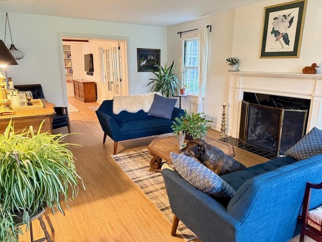 1651 E Ridge Rd, Beloit, WI 53511 - living room with wood finished floors and a fireplace