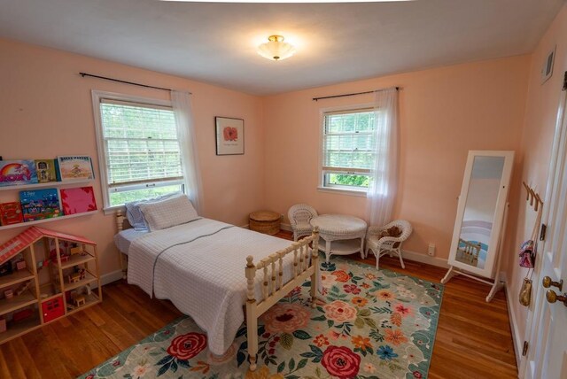 1651 E Ridge Rd, Beloit, WI 53511 - bedroom with wood finished floors and baseboards