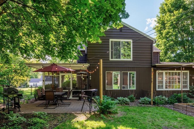 1651 E Ridge Rd, Beloit, WI 53511 - rear view of house featuring a patio area