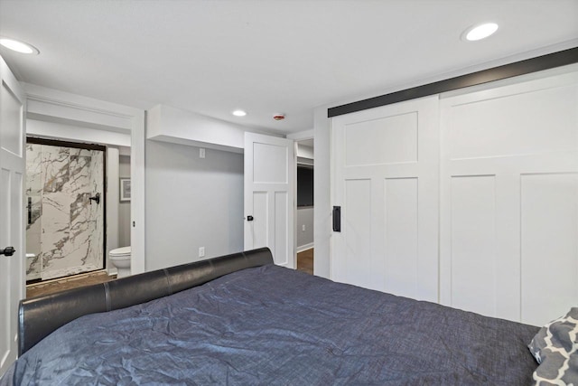 5741 N Santa Monica Blvd, Whitefish Bay, WI 53217 - bedroom featuring ensuite bath and recessed lighting