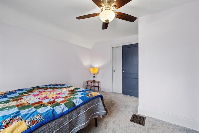 6309 12th St, Kenosha, WI 53144 - carpeted bedroom with ceiling fan, lofted ceiling, baseboards, and visible vents