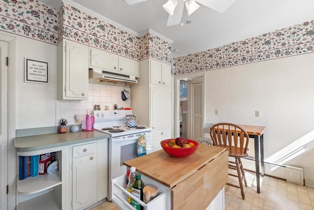 kitchen featuring ornamental molding, open shelves, under cabinet range hood, a ceiling fan, and white range with electric stovetop