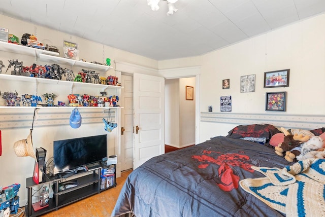 bedroom featuring wood finished floors