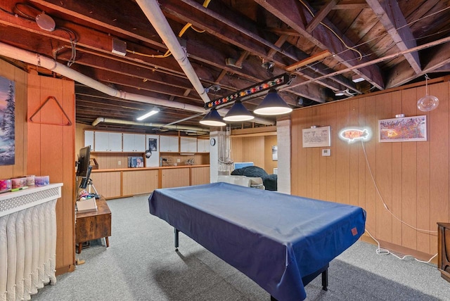 game room featuring carpet, wood walls, and pool table
