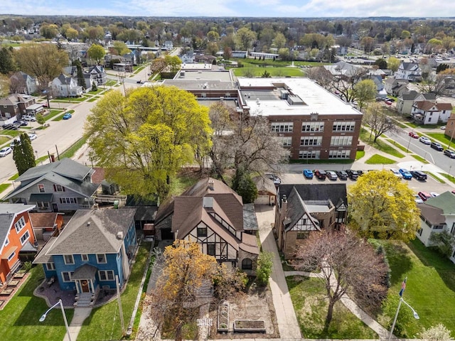 birds eye view of property with a residential view