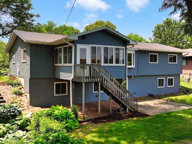 1511 Middleton St, Middleton, WI 53562 - back of house featuring a sunroom, stairs, a yard, and a patio area
