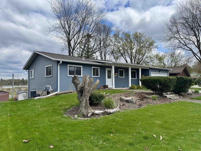 1511 Middleton St, Middleton, WI 53562 - view of front of property featuring an attached garage and a front yard