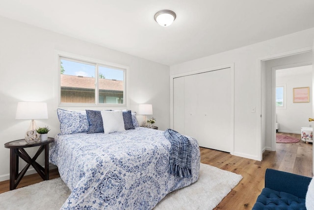1511 Middleton St, Middleton, WI 53562 - bedroom with a closet and wood finished floors
