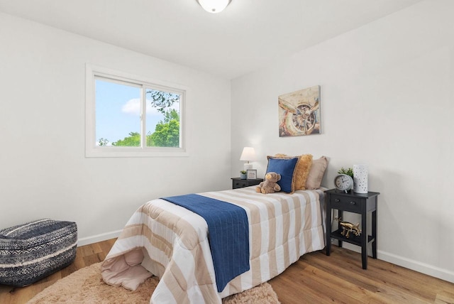 1511 Middleton St, Middleton, WI 53562 - bedroom with baseboards and wood finished floors
