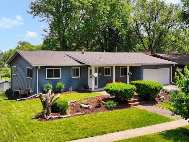 1511 Middleton St, Middleton, WI 53562 - ranch-style home with a garage, a front yard, driveway, and roof with shingles