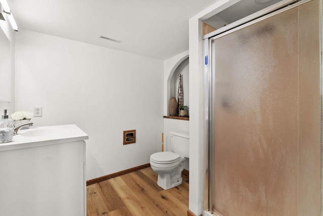1511 Middleton St, Middleton, WI 53562 - full bath with wood finished floors, vanity, and a shower stall