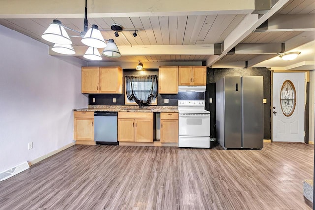 kitchen with light wood-type flooring, baseboards, light brown cabinetry, and appliances with stainless steel finishes