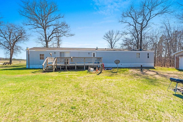 W7730 County Road Z, Pembine, WI 54156 - back of property featuring a wooden deck and a yard