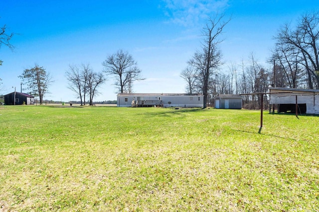 W7730 County Road Z, Pembine, WI 54156 - view of grassy yard featuring an outdoor structure and a shed