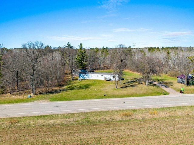 W7730 County Road Z, Pembine, WI 54156 - aerial view of property and surrounding area featuring a heavily wooded area