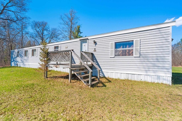 W7730 County Road Z, Pembine, WI 54156 - rear view of property with a deck and a lawn