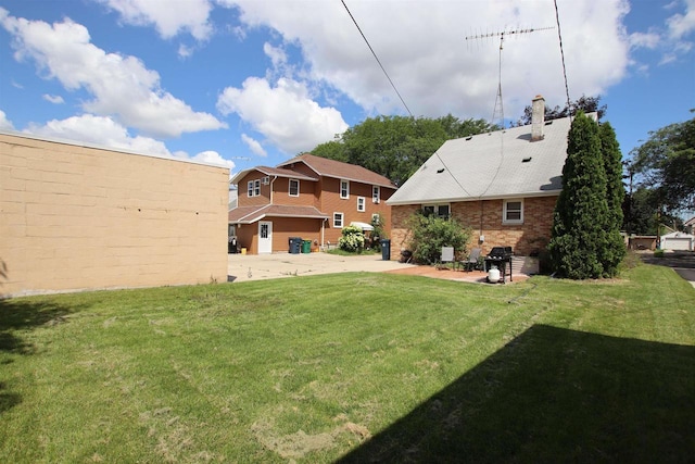 364 E 9th St, Fond Du Lac, WI 54935 - view of yard featuring a patio