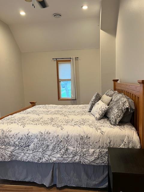 1075 Grant St, Fennimore, WI 53809 - bedroom with vaulted ceiling, wood finished floors, and recessed lighting