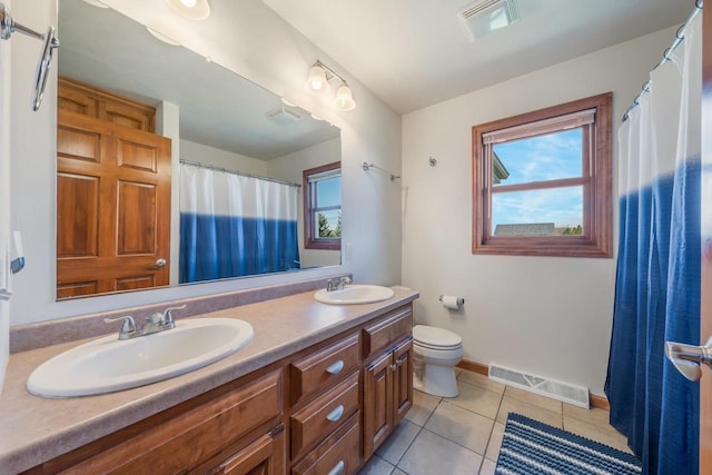 full bathroom featuring a sink, toilet, baseboards, and visible vents